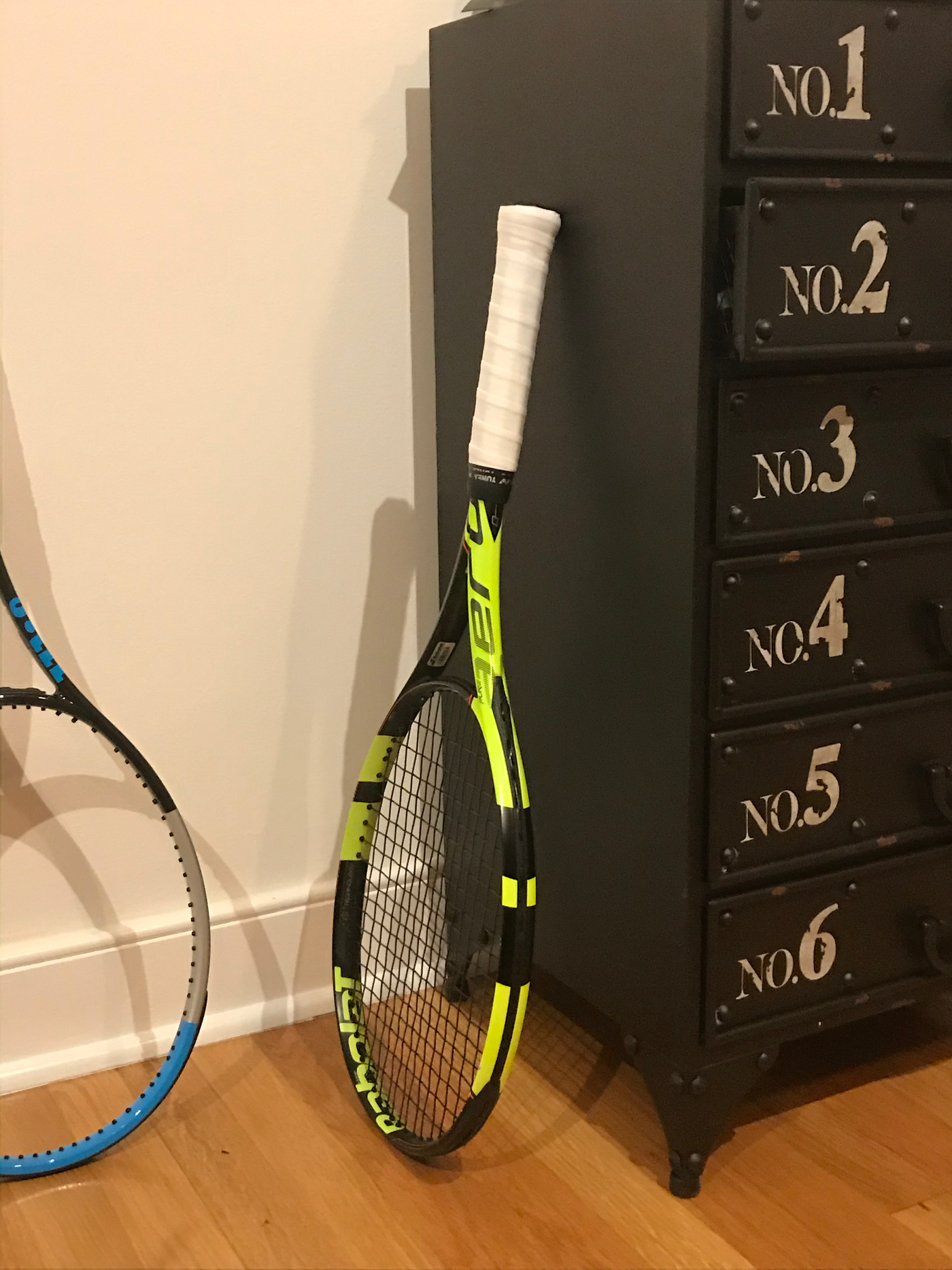 Signature stringing service and over grip